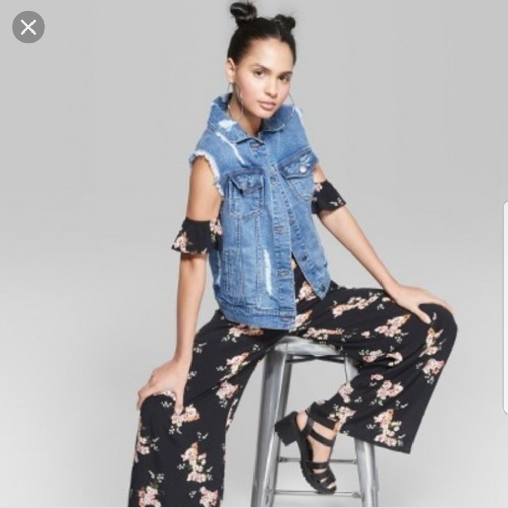 Black flowered jumpsuit with arm cuffs